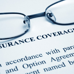 Eye glasses on an insurance coverage form