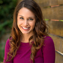 a woman smiling after getting veneers in Arlington