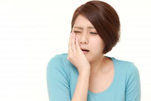 woman with mouth pain