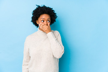 person whose dental bridge fell out covering their mouth